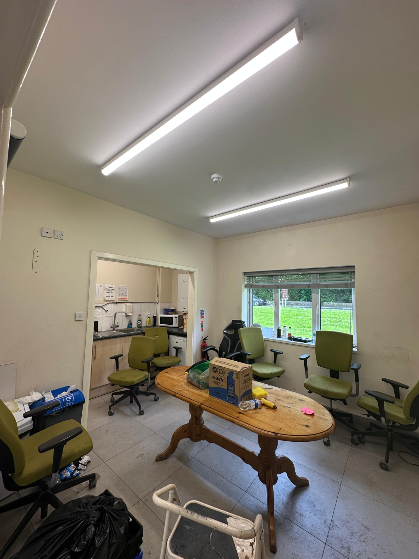 Office breakroom fitted with continuous LED strip lighting during a commercial refurbishment